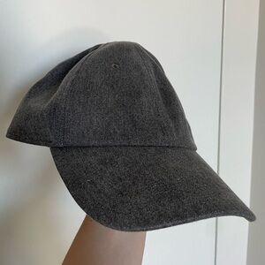 Aritzia Tna Baseball snapback in washed black.